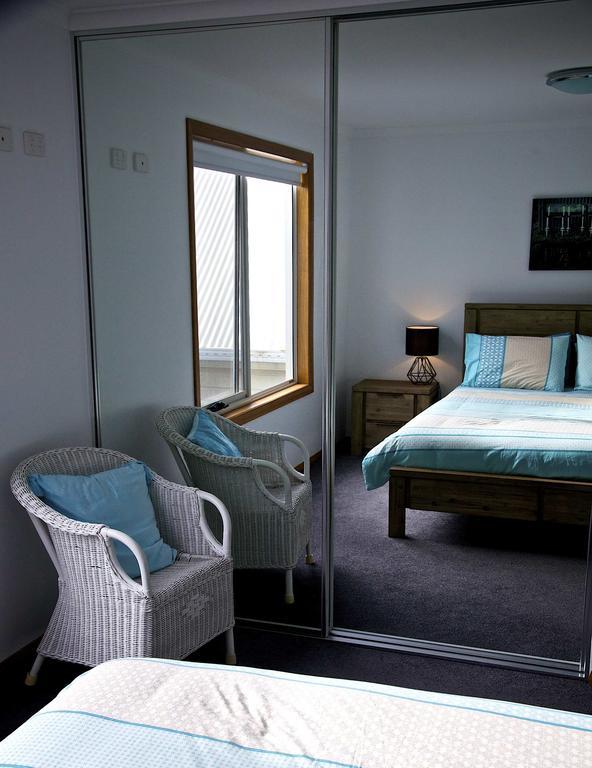 Penguin Beachfront Apartamentos Habitación foto